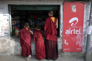 Tibetan monks at a shop in McLeodganj, Dharamshala